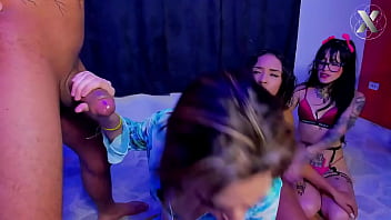 Jazmin and her friend give this big cock some very ruthless strong blowjobs