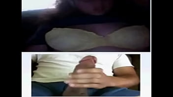 Nerdy girl with glasses licking her tits on webcam