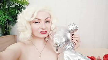 Pretty nude blond female smiles