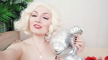 Pretty nude blond female smiles