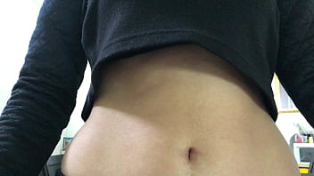 Oval shaped navel close up and looking inside her navel