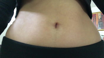 Oval shaped navel close up and looking inside her navel