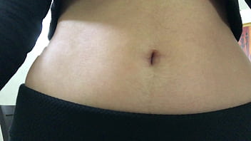 Oval shaped navel close up and looking inside her navel Oval shaped navel close up and looking inside her navel