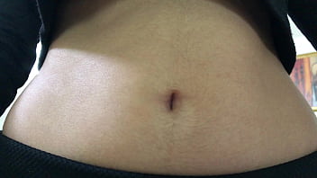 Oval shaped navel close up and looking inside her navel