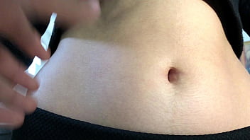 Oval shaped navel close up and looking inside her navel