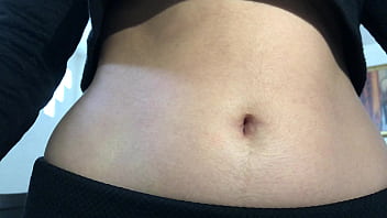 Oval shaped navel close up and looking inside her navel
