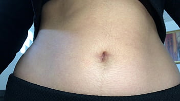 Oval shaped navel close up and looking inside her navel