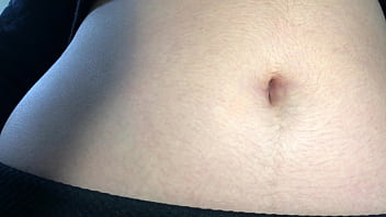 Oval shaped navel close up and looking inside her navel