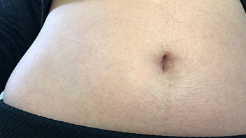 Oval shaped navel close up and looking inside her navel