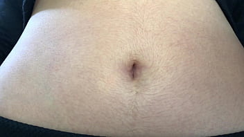 Oval shaped navel close up and looking inside her navel Oval shaped navel close up and looking inside her navel