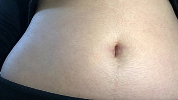 Oval shaped navel close up and looking inside her navel
