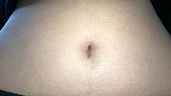Oval shaped navel close up and looking inside her navel Oval shaped navel close up and looking inside her navel