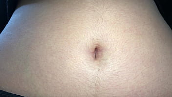 Oval shaped navel close up and looking inside her navel