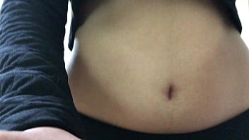 Oval shaped navel close up and looking inside her navel Oval shaped navel close up and looking inside her navel