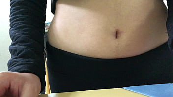 Oval shaped navel close up and looking inside her navel