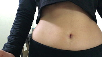 Oval shaped navel close up and looking inside her navel