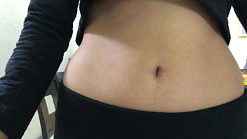 Oval shaped navel close up and looking inside her navel