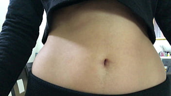 Oval shaped navel close up and looking inside her navel