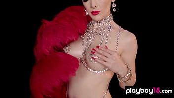 Glamorous blonde burlesque babe posing in her sexy lingerie