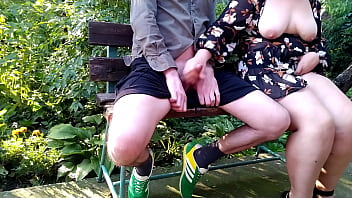 Curvy step mother flashed her natural tits in a public park and made her step son cum
