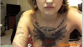 Brunet with tatoos using a toy and wont come till eveyone does