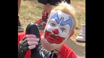 Muddy boot worshiping by flipflop the clown at the 2018 gathering of the juggalos