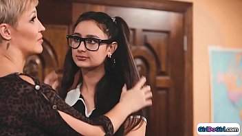 Nerdy teen is comforted by her busty milf doesnt believe her and her teacher will prove it with a kiss instead of coed sucks on her big tits and facesits her teacher on the desk