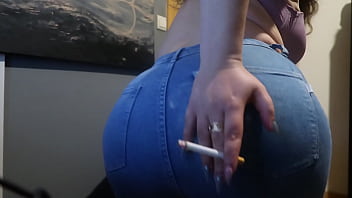 Hot blonde with curves smokes and show her big boobs