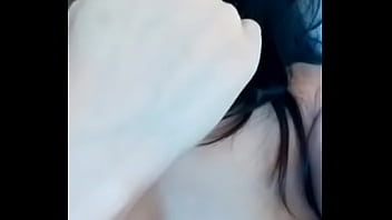 Asian hotty playing with her breast