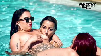 Lesbians enjoying the pool and having sex