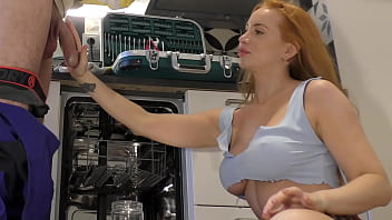 Sexy and horny redhead housewife teases a big cock plumber and gives him a handjob while recording him