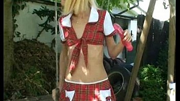 Blonde girl on a swing