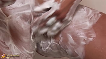 Sexy big natural milf takes a hot shower and shavinger her soapy pussy