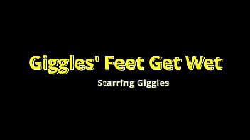 Giggles' feet get wet at the beach on beat2feetcom