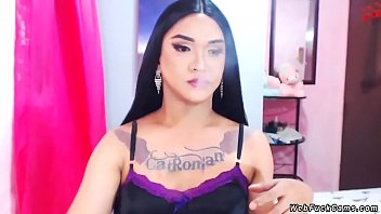 Dark haired shemale amateur lady sitting in lingerie and chatting in private live webcam show then lingerie and smoking cigarette