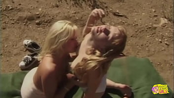 A blonde milf gets all her holes licked and plugged outdoors