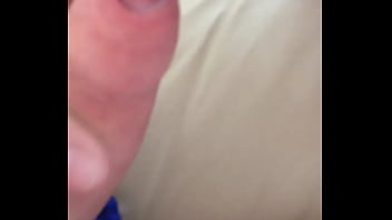 Milking her pert breasts