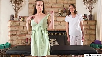 Beatiful masseuse lets her client use the bolster so that she can properly massage her that she gets horny and start licking her pussy