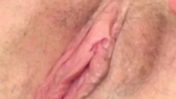 Natalia plays with her hairy messy wet cunt