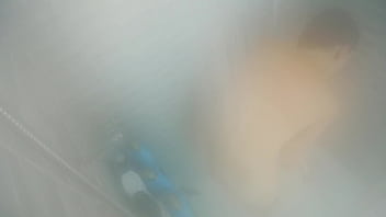 Taking a hot steamy showing and shaving my pussy