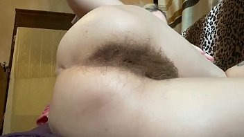 Amateur hairy teen shows off her huge bush and hairy body parts after shower