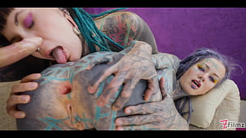 Inked babe gets down and dirty in a threesome with two edgy alternative girls