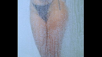 Tanned campus hottie rinses off in her bikini after a long day