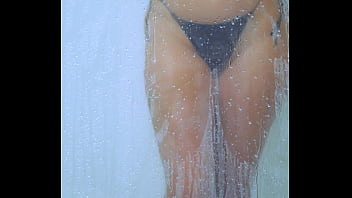 Tanned campus hottie rinses off in her bikini after a long day