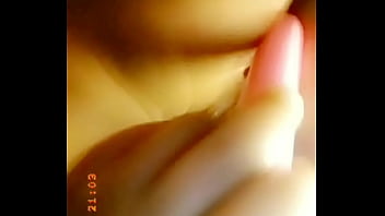 Playing with a dildo