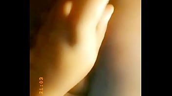 Playing with a dildo