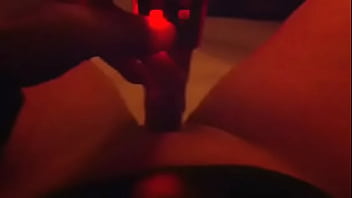 Using a dildo on her wet cunt