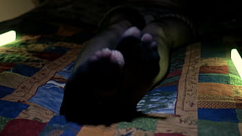 Perfect toes peeking through sexy fishnets