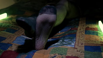 Perfect toes peeking through sexy fishnets