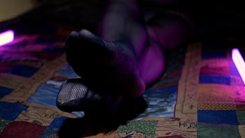 Perfect toes peeking through sexy fishnets